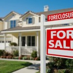 Foreclosure sign in front of a house