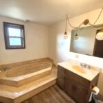 Downstairs bathroom with garden tub